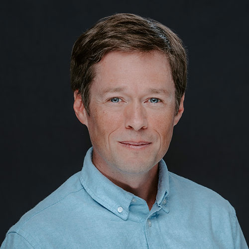 A headshot of Daniel O'Malley
