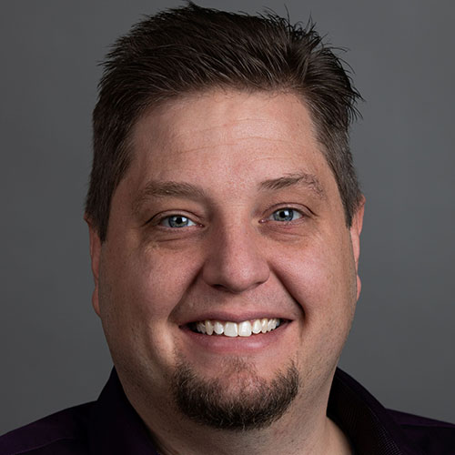A headshot of Dirk Van Essendelft