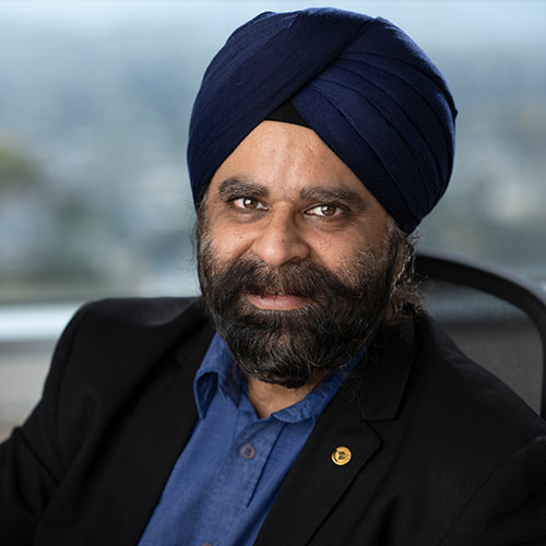 A headshot of Inder Monga,