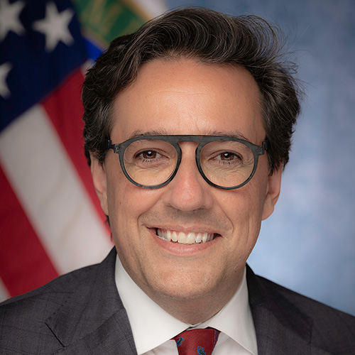 A headshot of Dr. Dario Gil